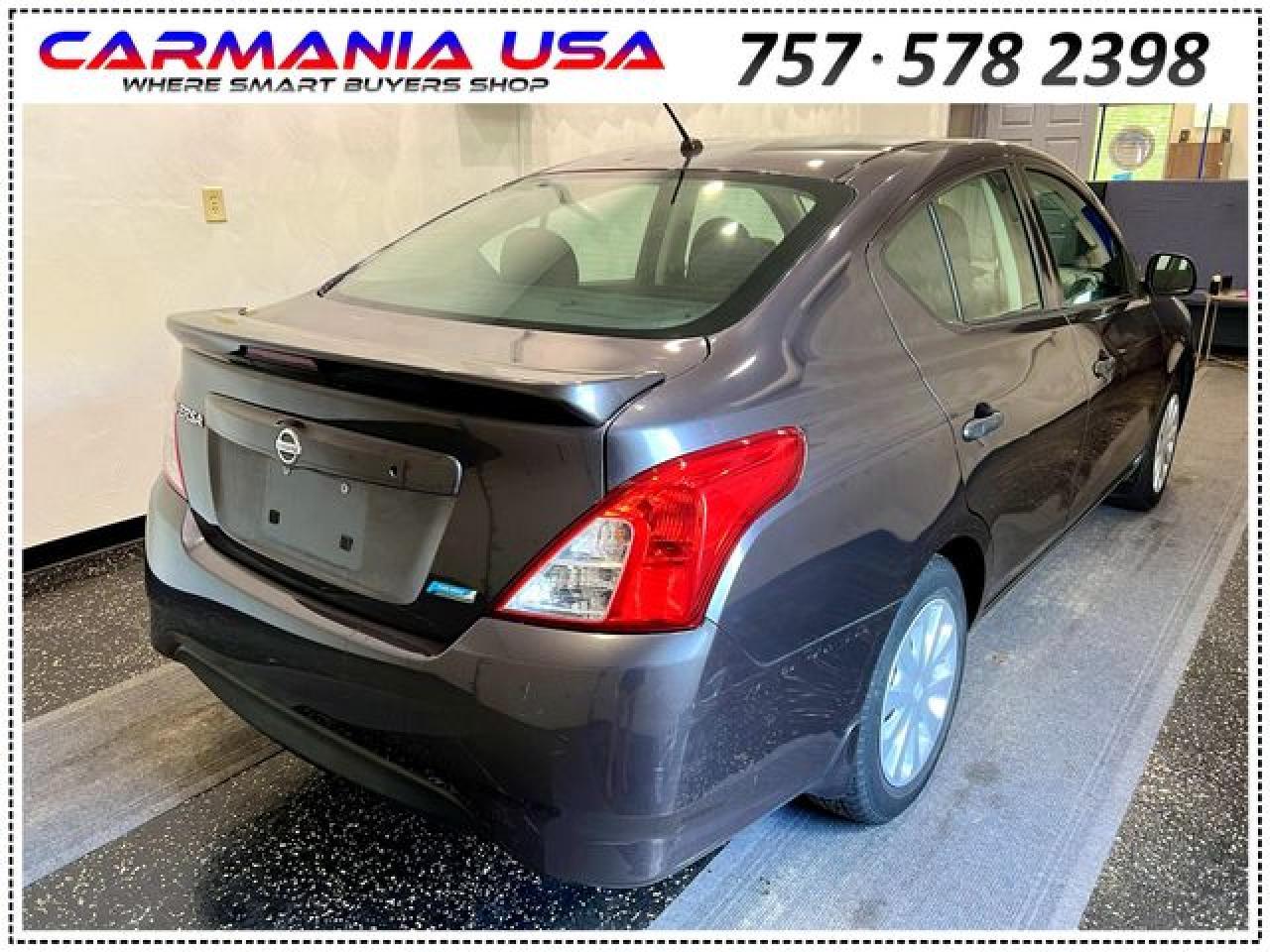 2015 Nissan Versa S - Фото 6