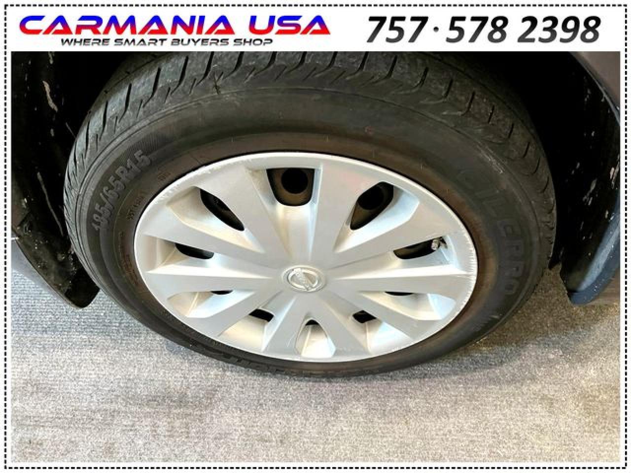 2015 Nissan Versa S - Фото 4