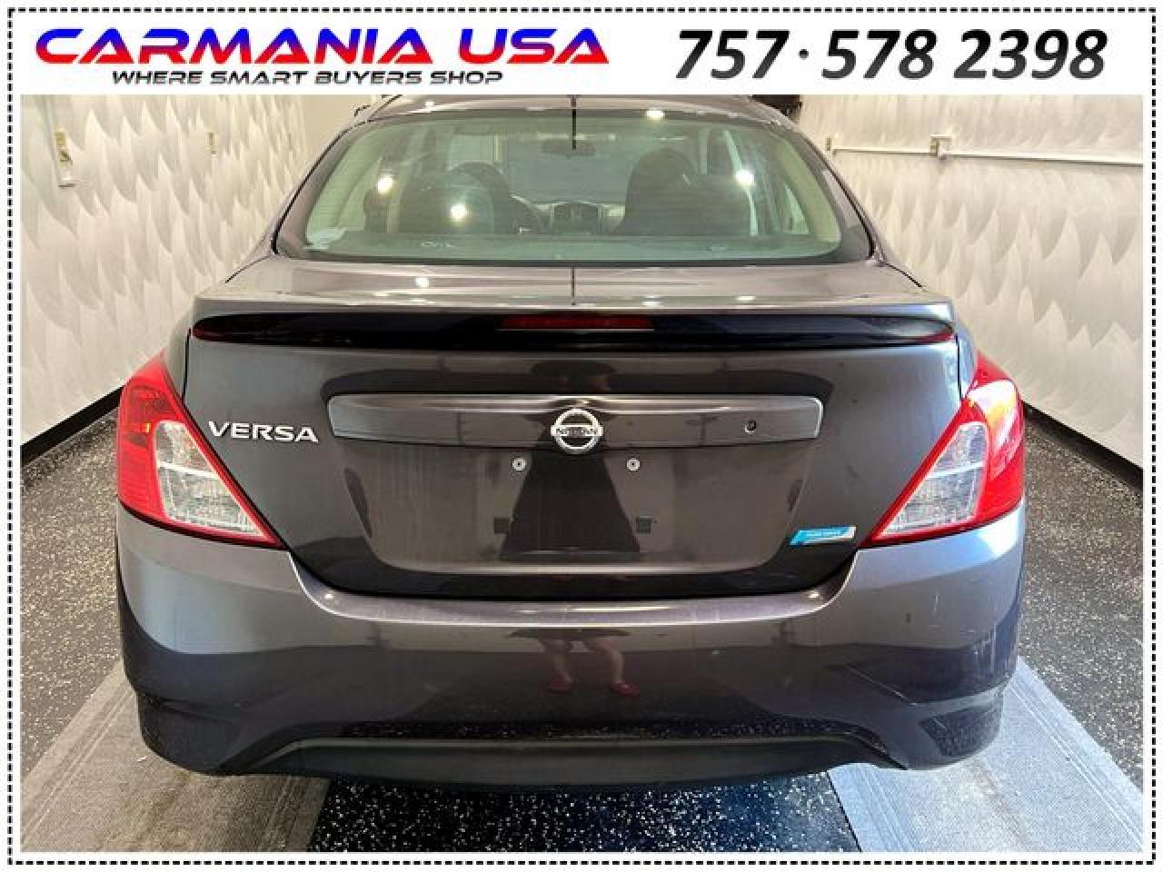 2015 Nissan Versa S - Фото 7