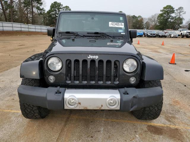 2015 Jeep Wrangler Unlimited Sahara - Фото 5