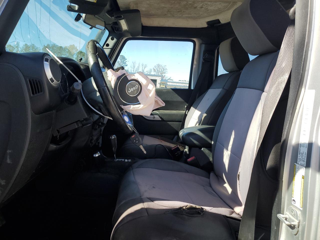 2012 Jeep Wrangler Unlimited Sahara - Фото 7