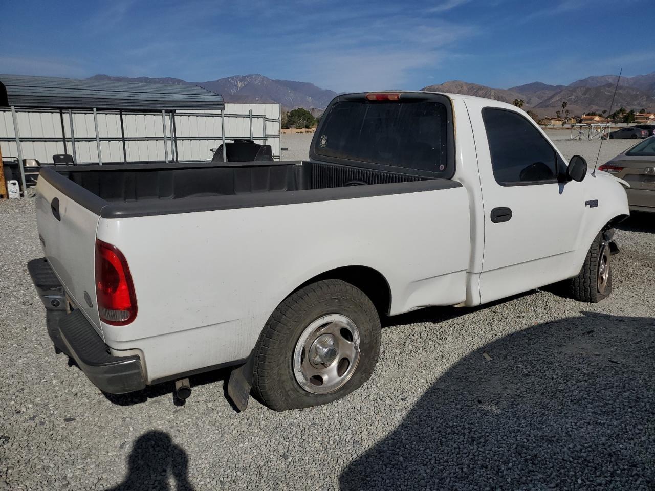 2003 Ford F150 - Фото 3