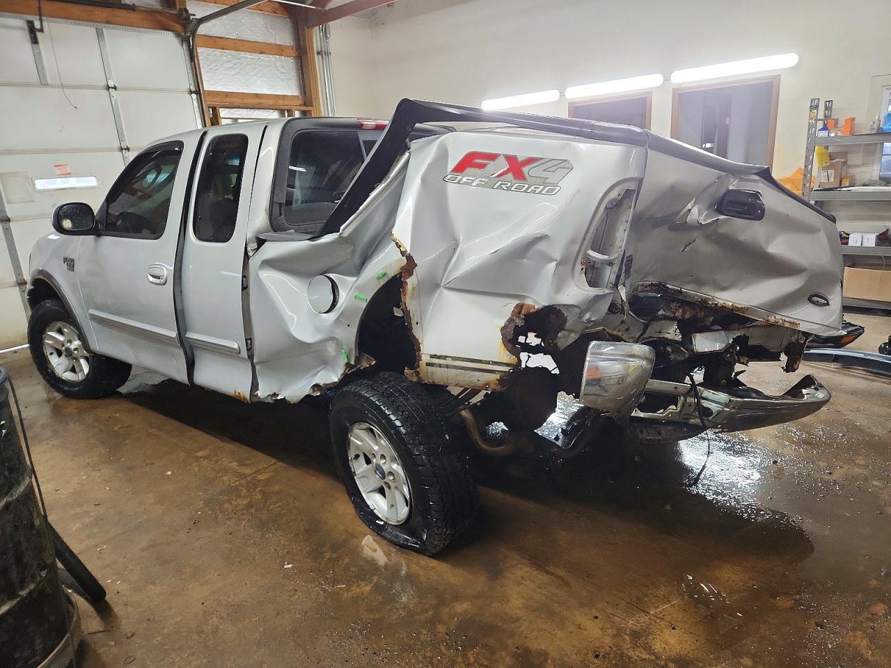 2003 Ford F150 - Фото 2