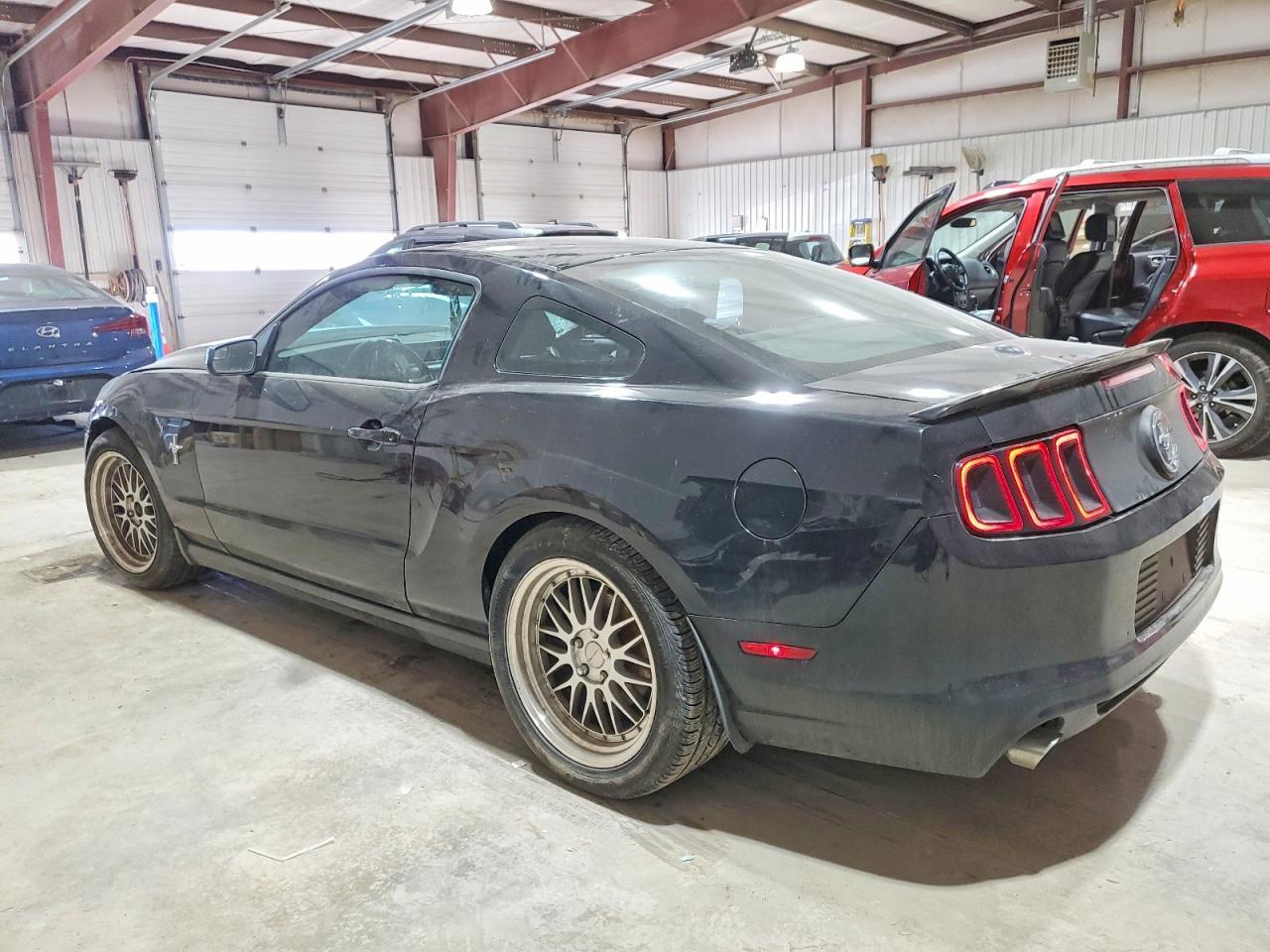 2014 Ford Mustang - Фото 2