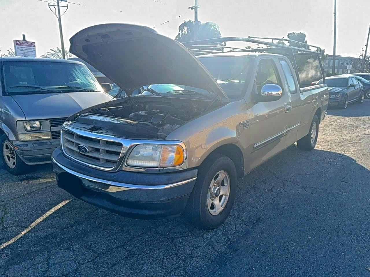 2001 Ford F150 - Фото 2