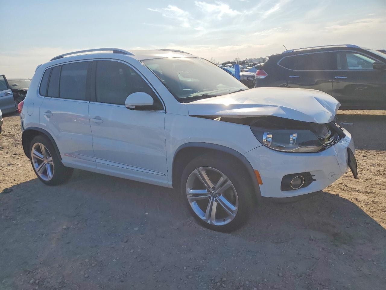 2016 Volkswagen Tiguan S - Фото 4