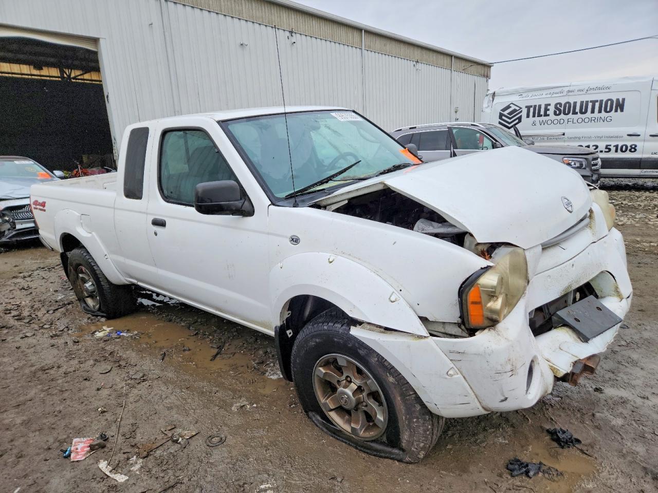 2003 Nissan Frontier Xe-V6 - Фото 4