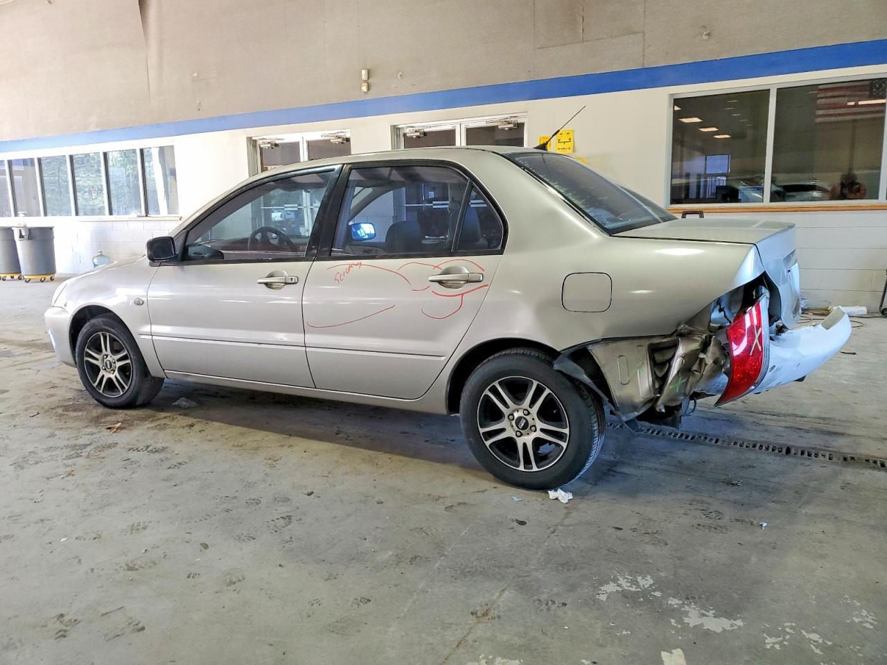 2004 Mitsubishi Lancer Es - Фото 2