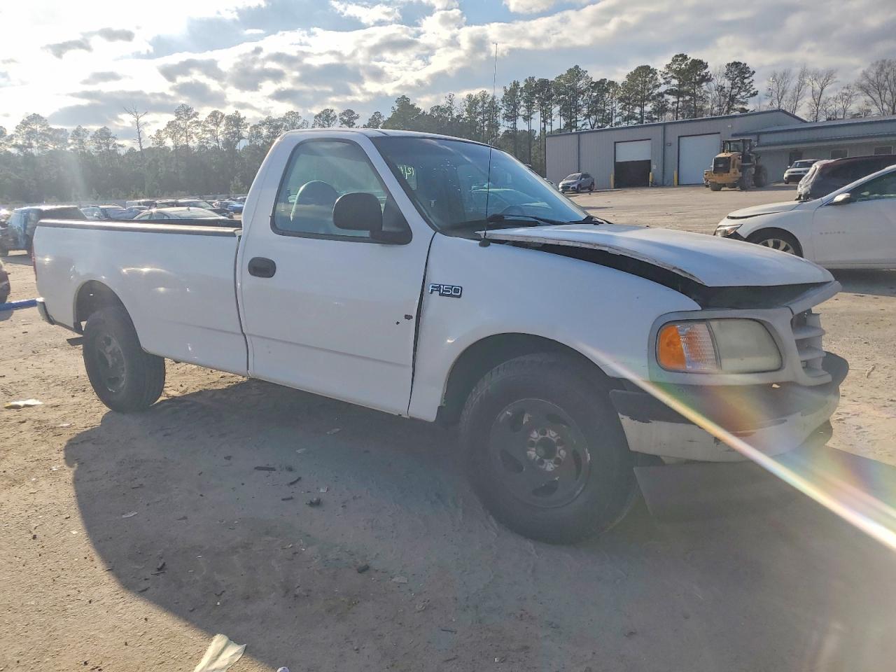 1999 Ford F150 - Фото 4