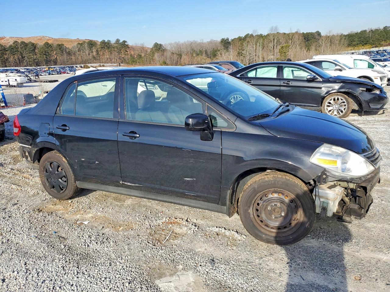 2011 Nissan Versa S - Фото 4