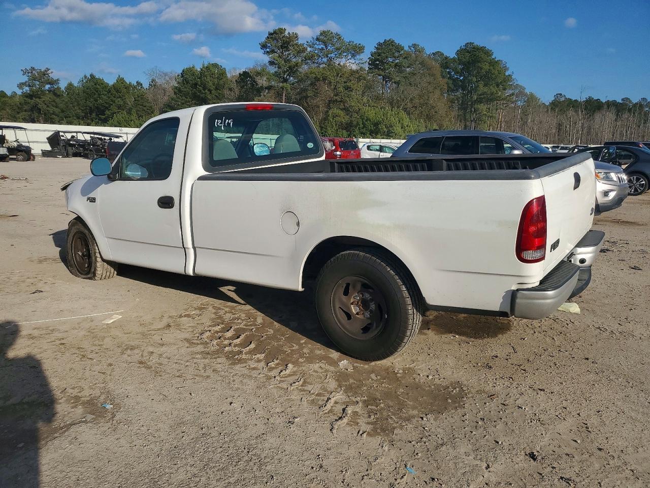 1999 Ford F150 - Фото 2