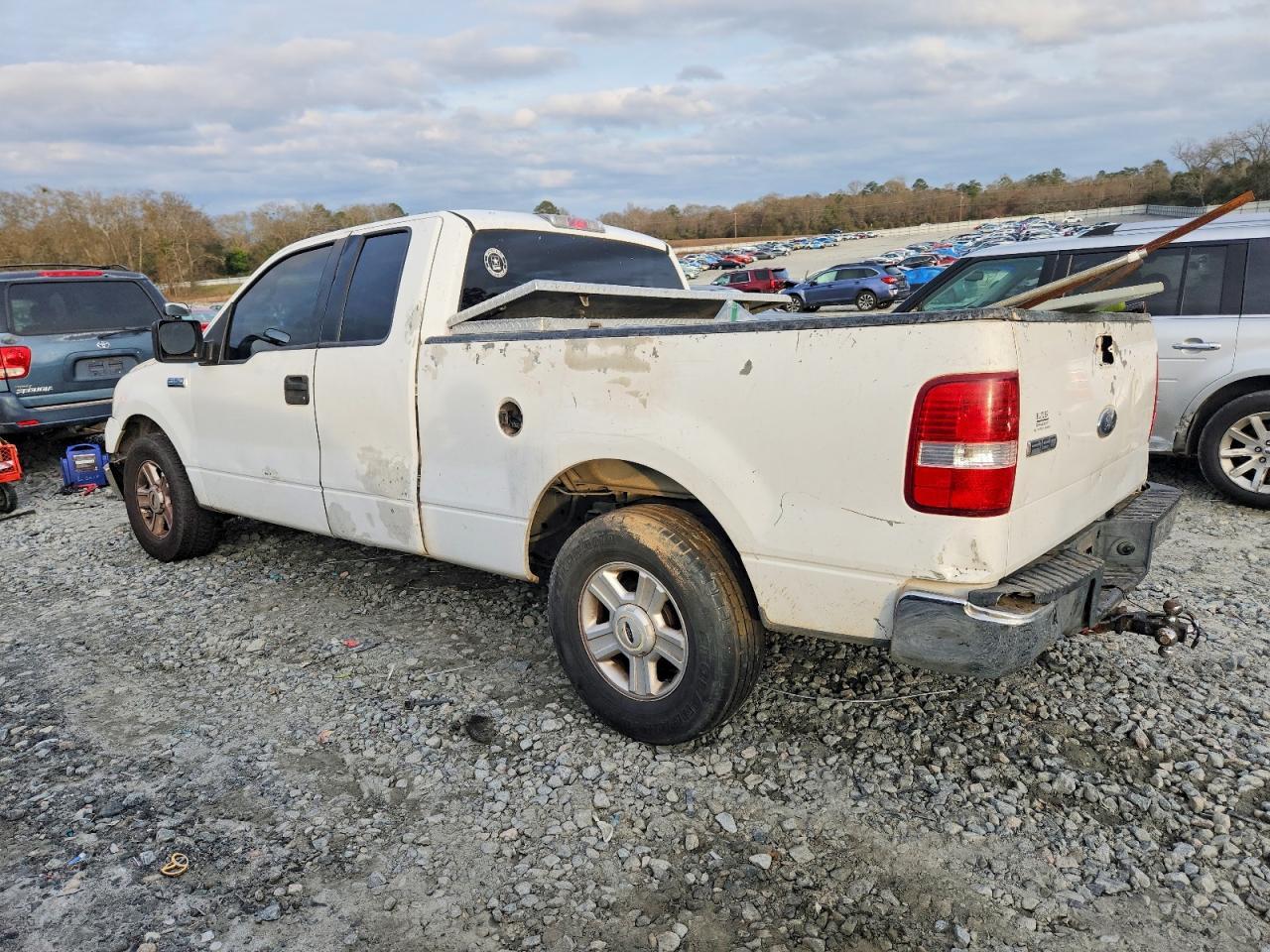 2004 Ford F150 - Фото 2