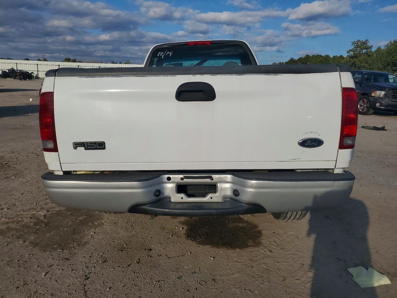 1999 Ford F150 - Фото 6