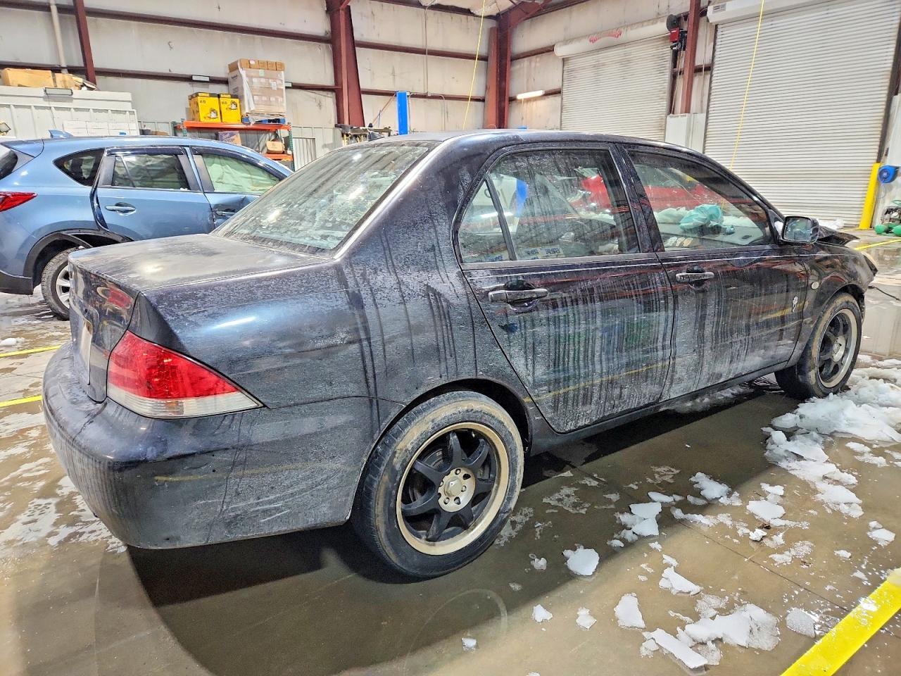 2005 Mitsubishi Lancer Es - Фото 3