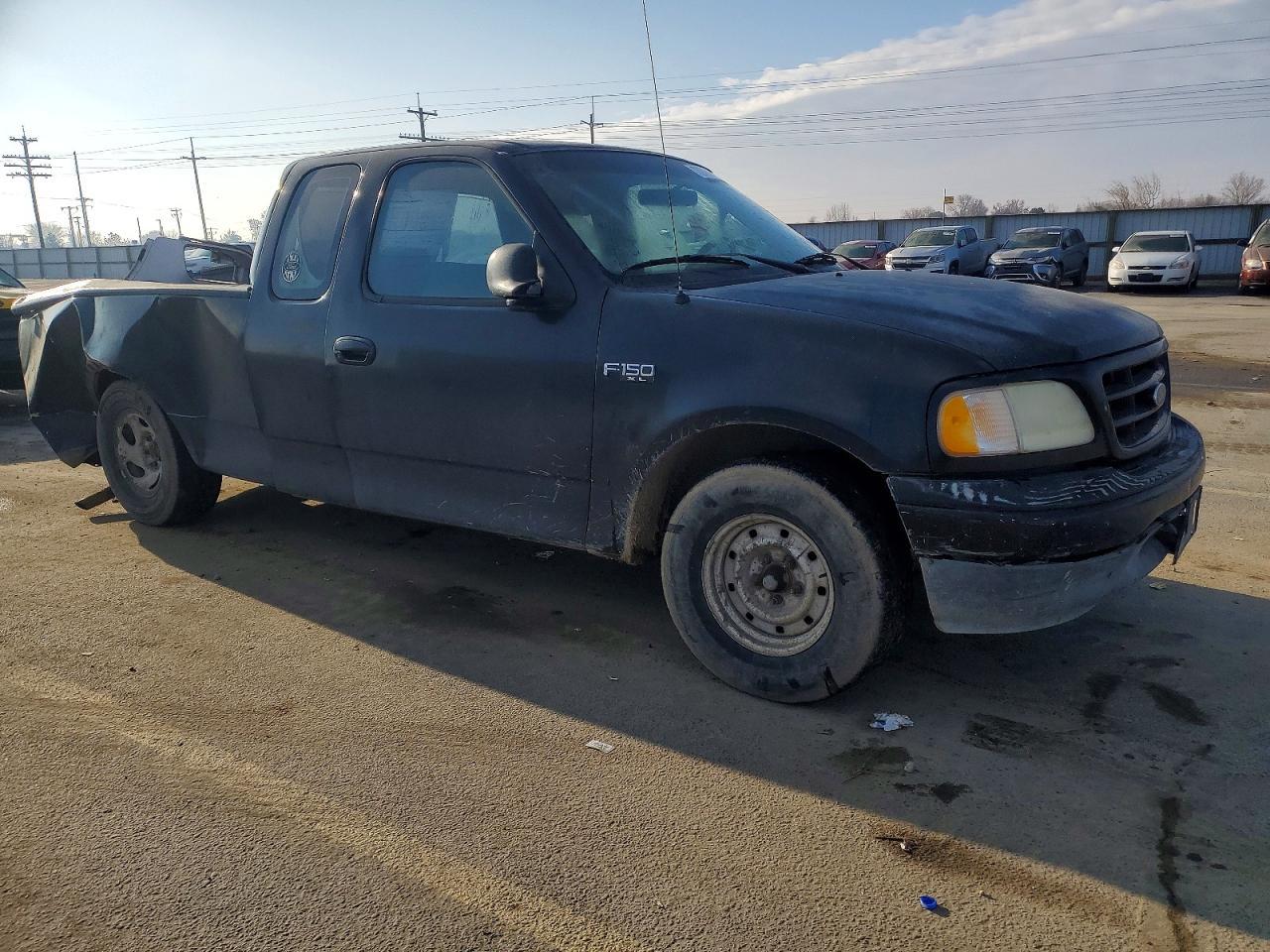 2001 Ford F150 - Фото 4