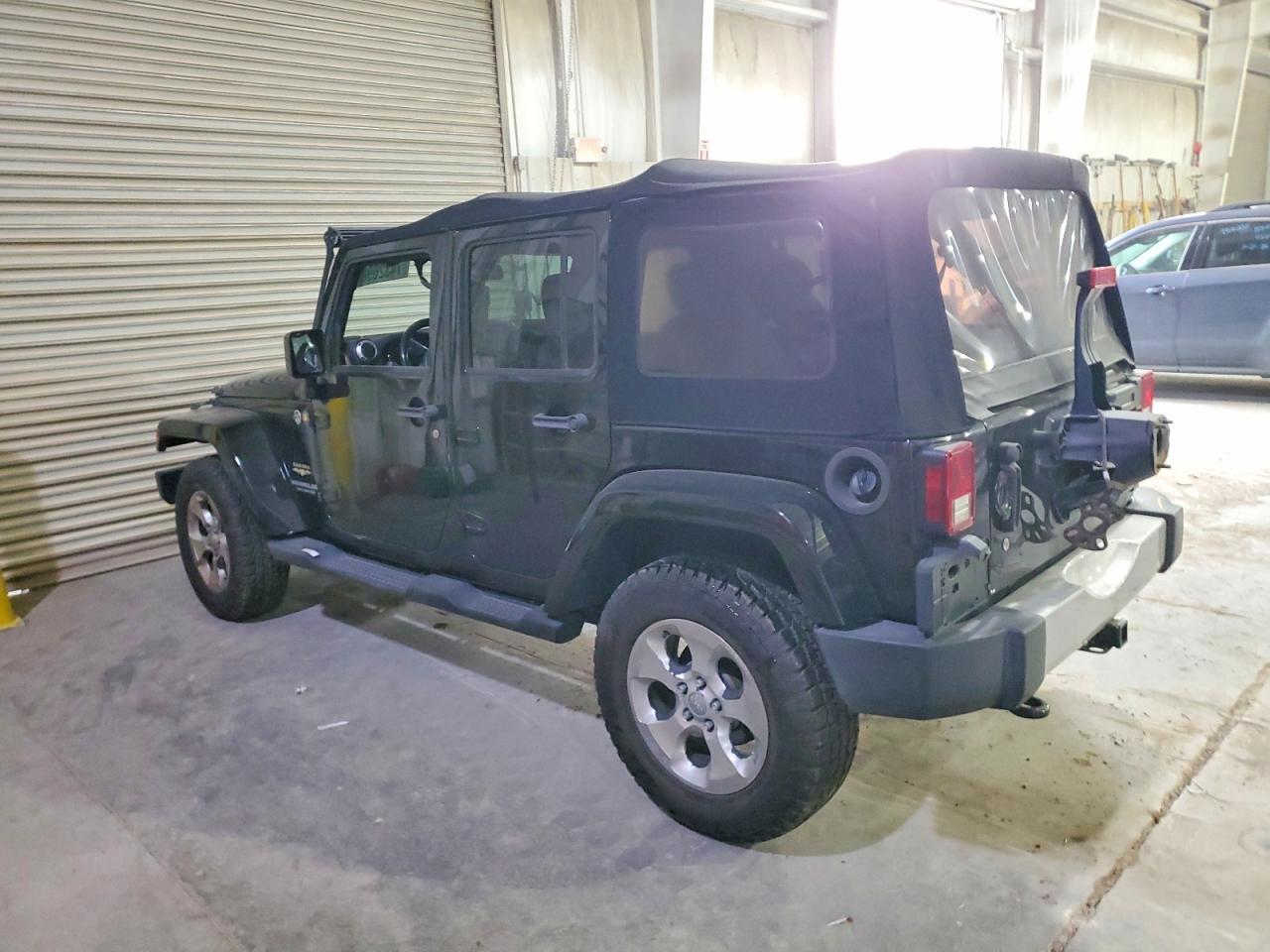 2015 Jeep Wrangler Unlimited Sahara - Фото 2