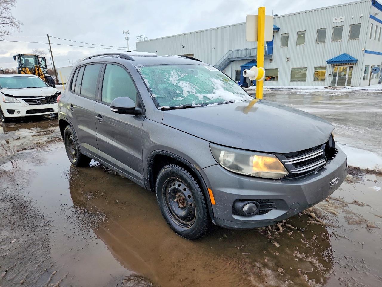 2014 Volkswagen Tiguan S - Фото 4