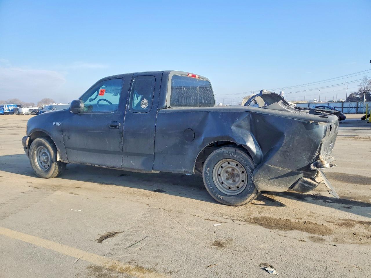 2001 Ford F150 - Фото 2