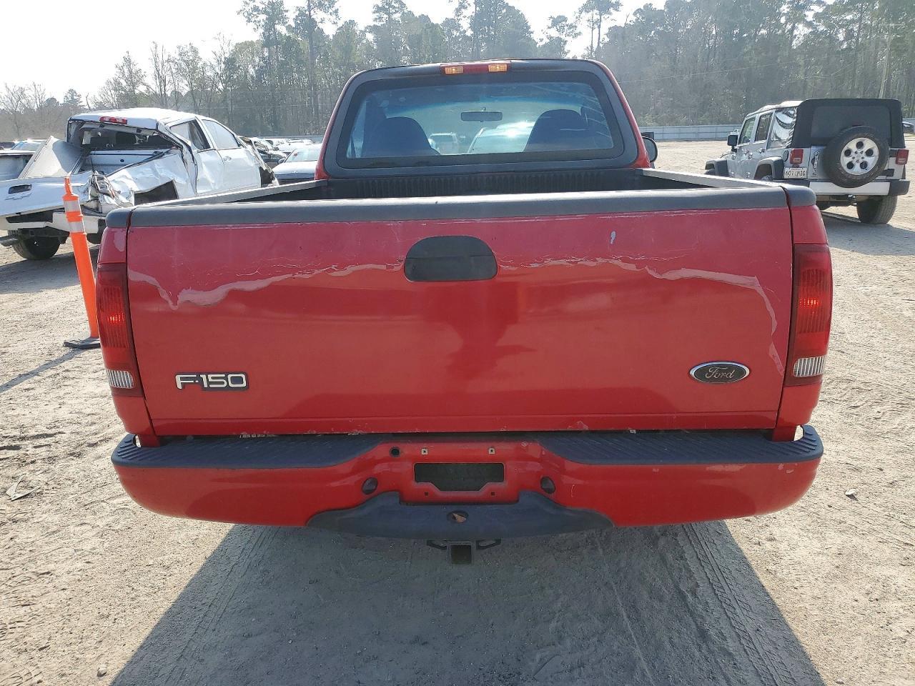 2003 Ford F150 - Фото 6