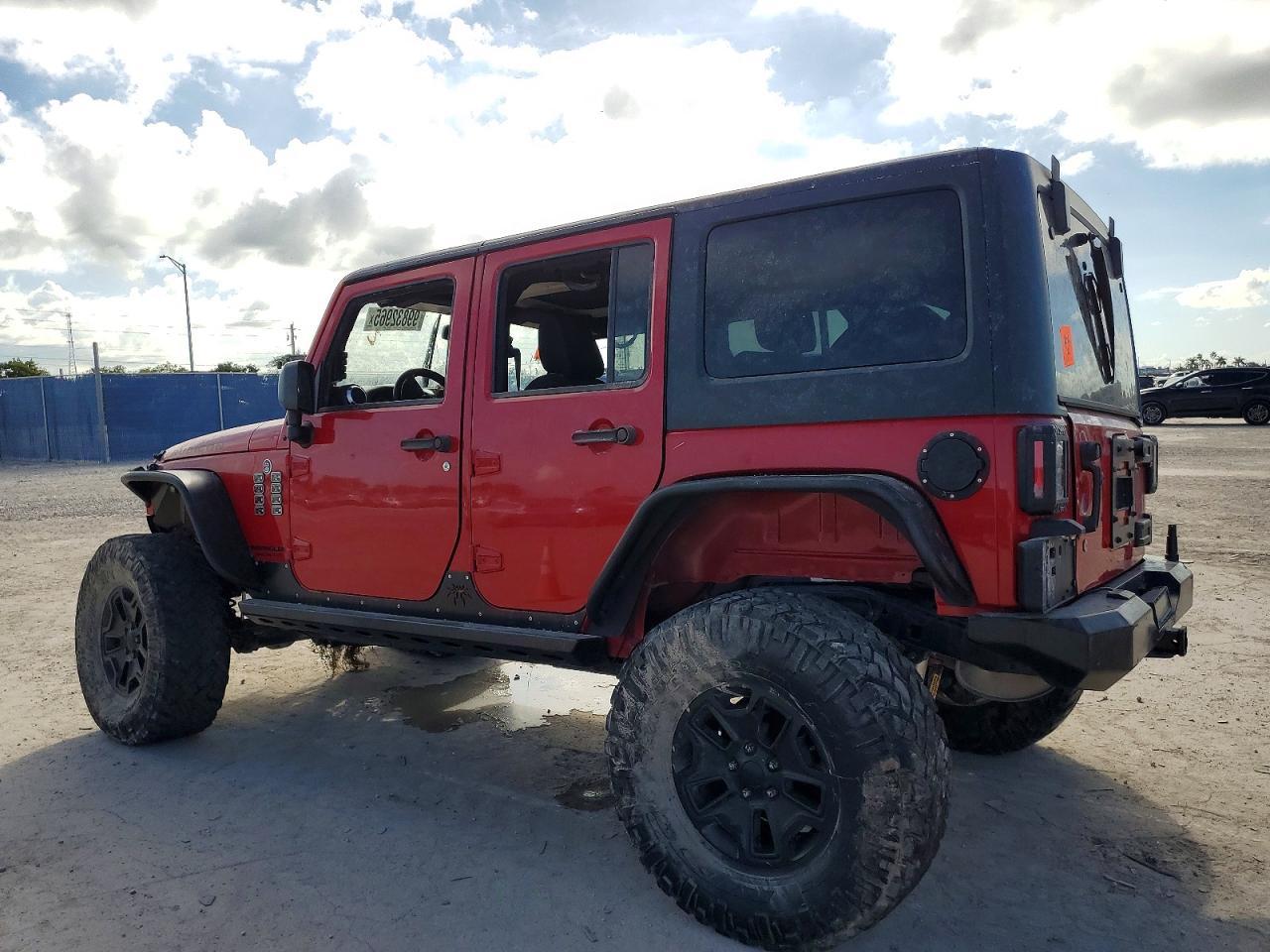 2014 Jeep Wrangler Unlimited Rubicon - Фото 2