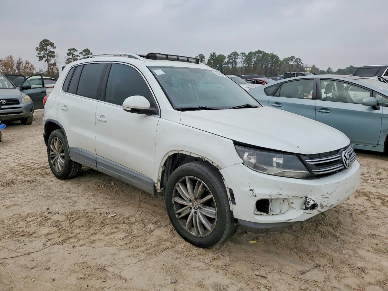 2014 Volkswagen Tiguan S - Фото 4