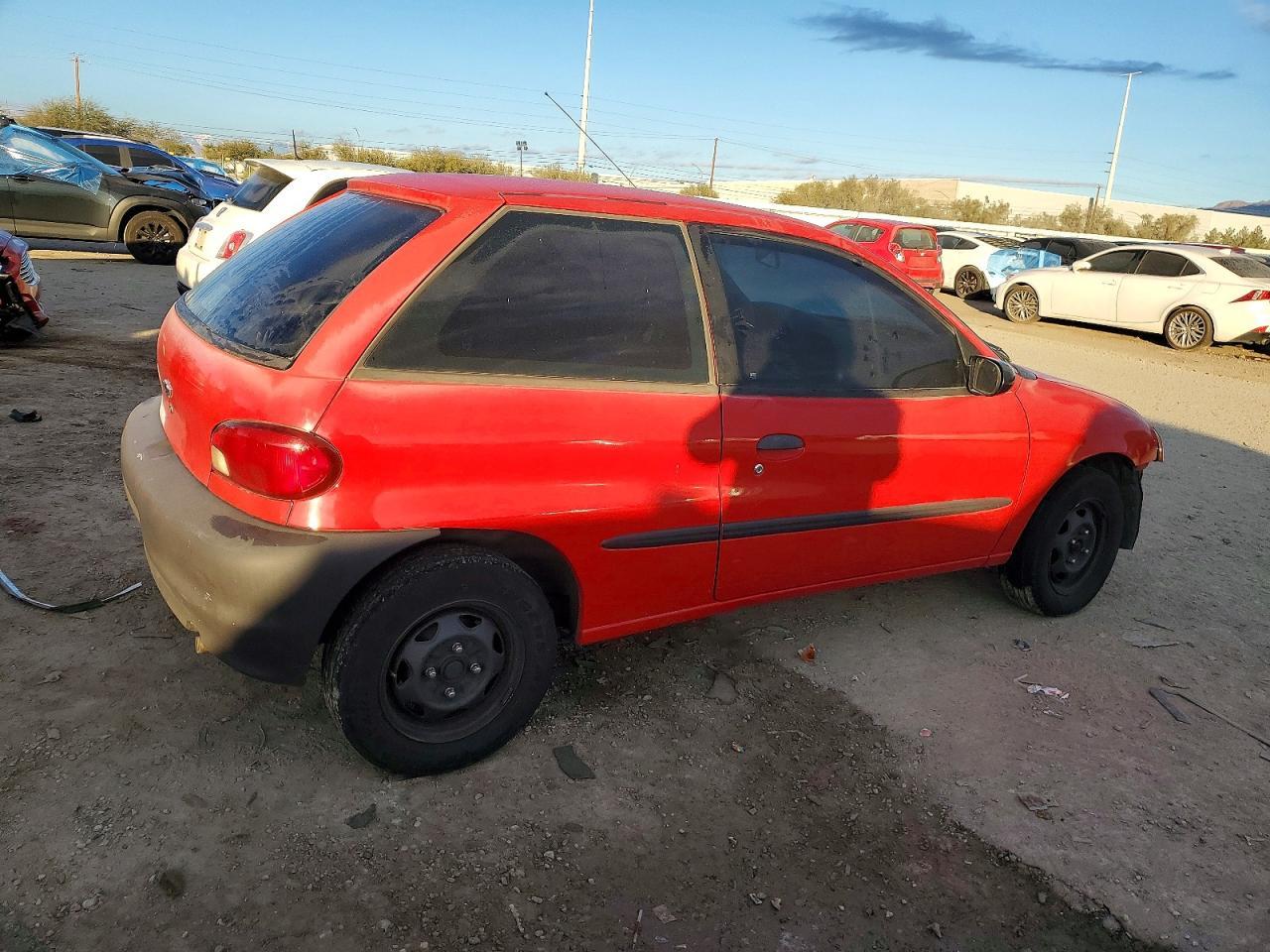 2000 Chevrolet Metro - Фото 3