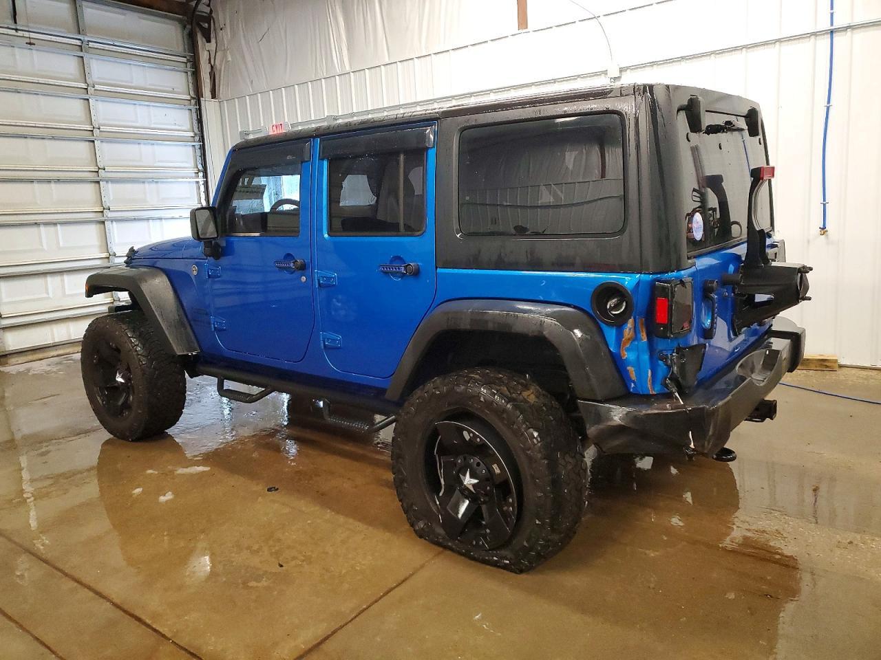 2015 Jeep Wrangler Unlimited Sport - Фото 2