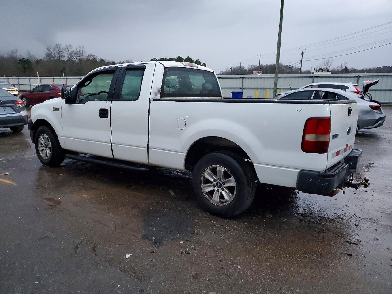 2005 Ford F150 - Фото 2