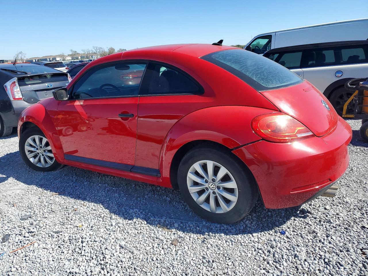 2015 Volkswagen Beetle 1.8T - Фото 2