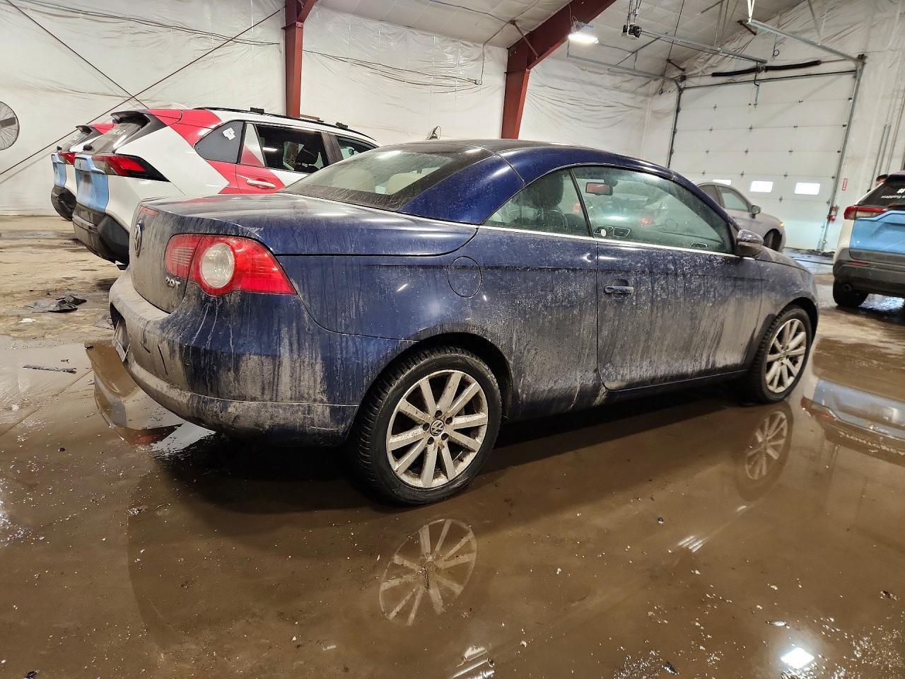 2009 Volkswagen Eos Lux - Image 3