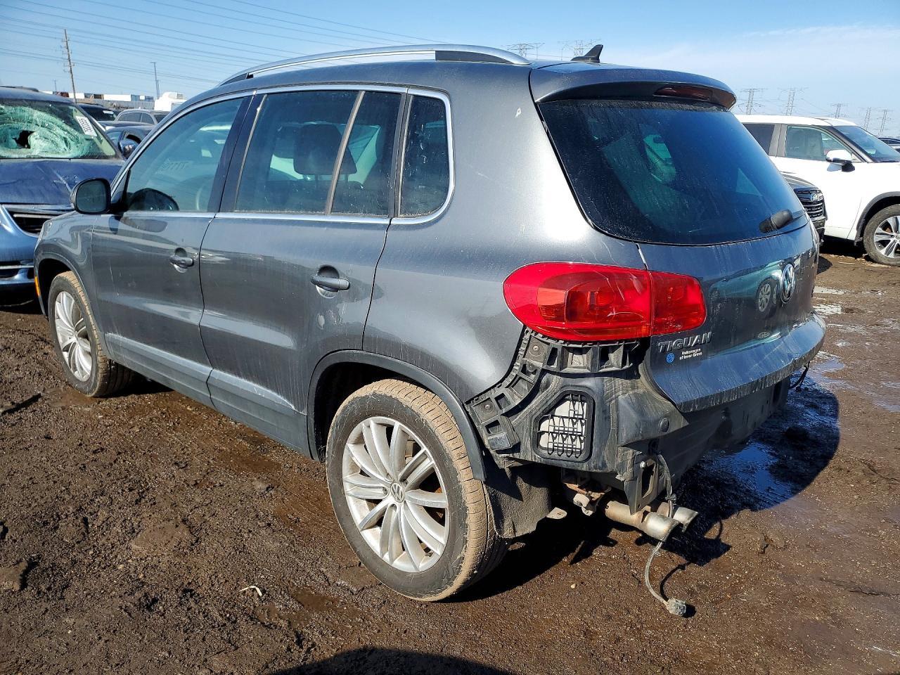 2014 Volkswagen Tiguan S - Фото 2