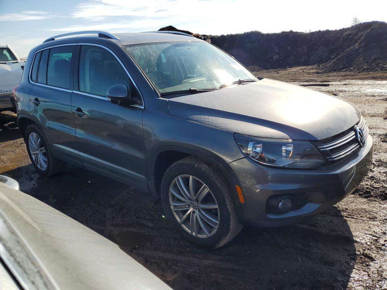 2014 Volkswagen Tiguan S - Фото 4