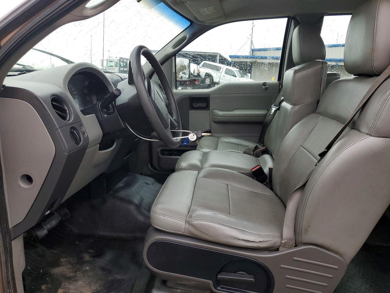 2004 Ford F150 - Фото 7