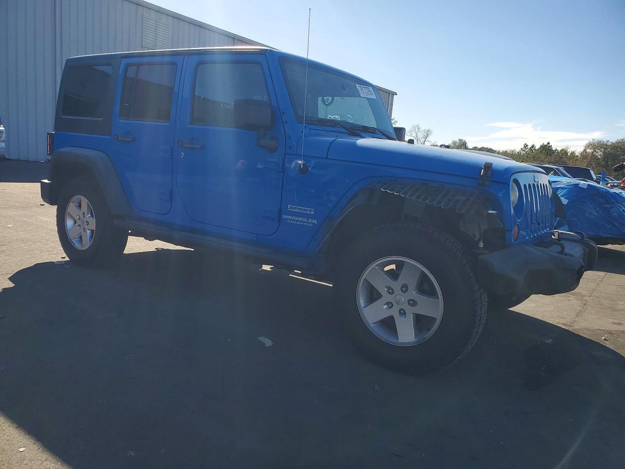2011 Jeep Wrangler Unlimited Sport - Фото 4