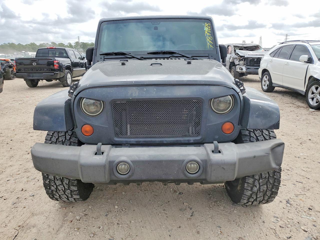 2012 Jeep Wrangler Unlimited Sahara - Фото 5