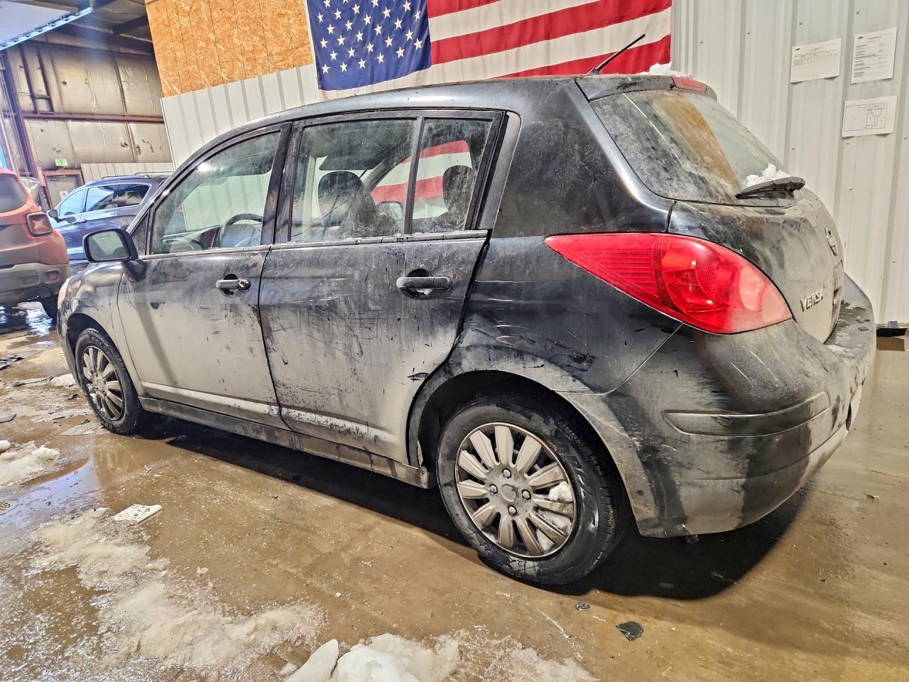 2011 Nissan Versa S - Фото 2