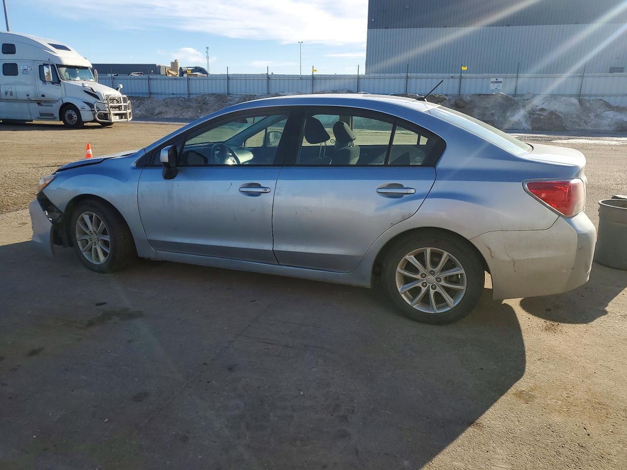 2014 Subaru Impreza Premium - Фото 2