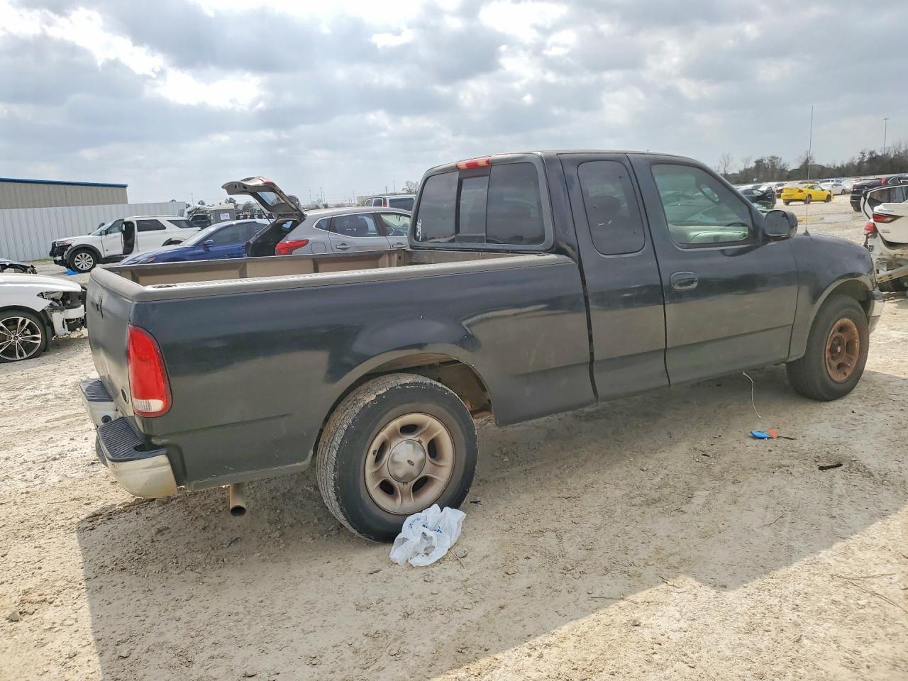 2002 Ford F150 - Фото 3