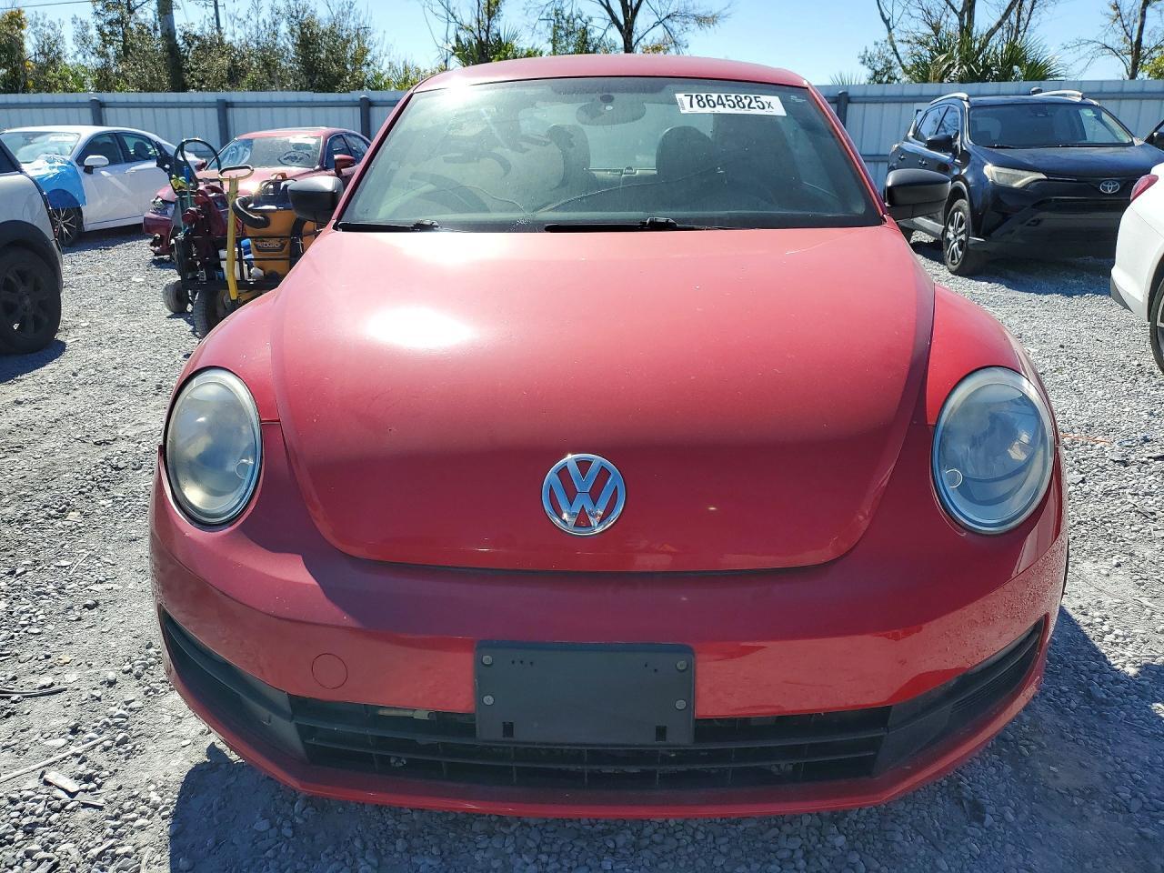 2015 Volkswagen Beetle 1.8T - Фото 5