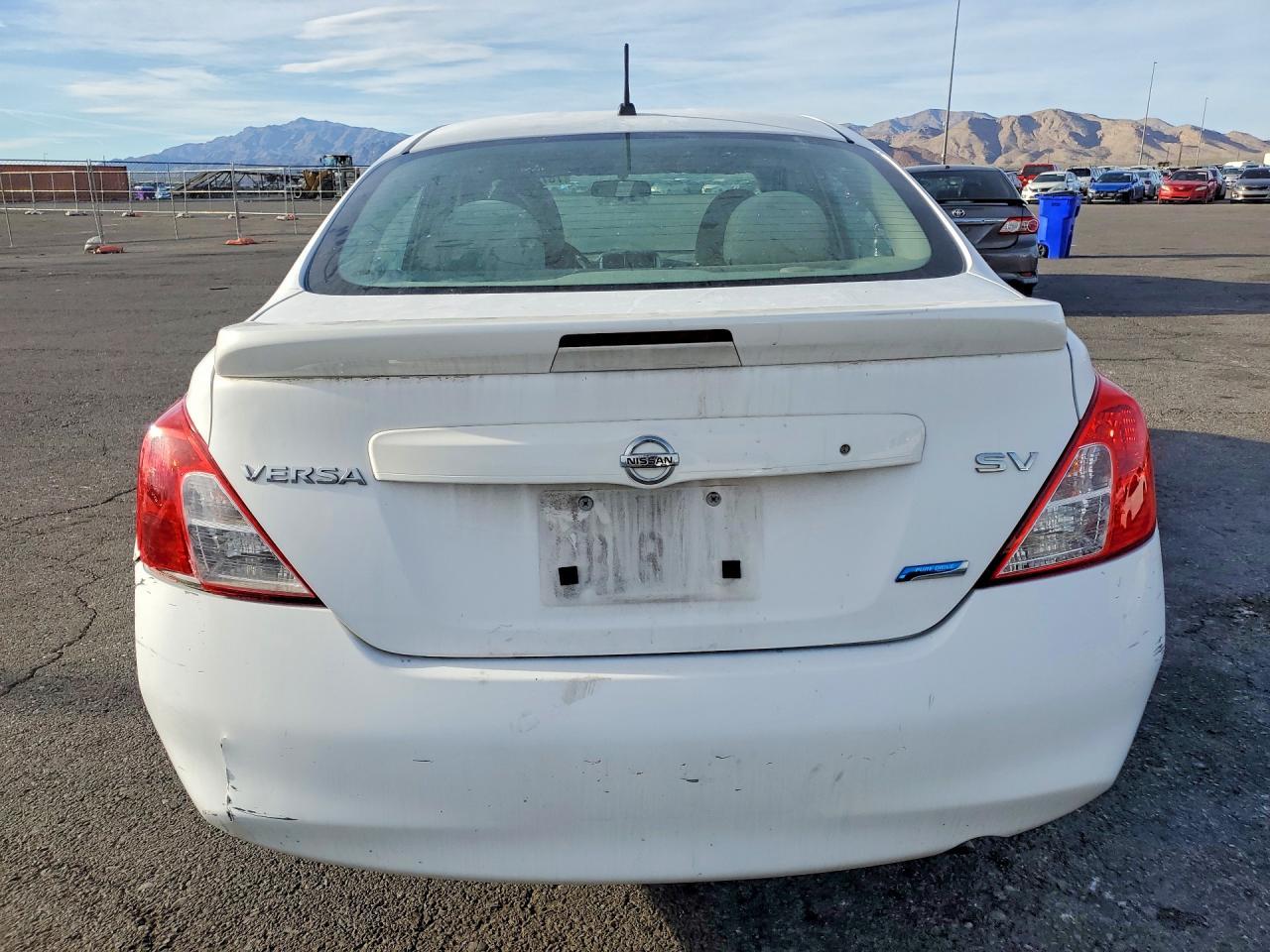 2014 Nissan Versa - Фото 6