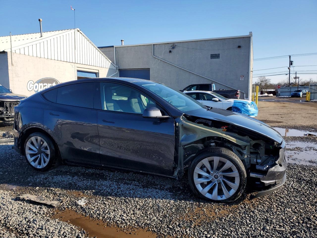 2026 Tesla Model Y - Фото 4