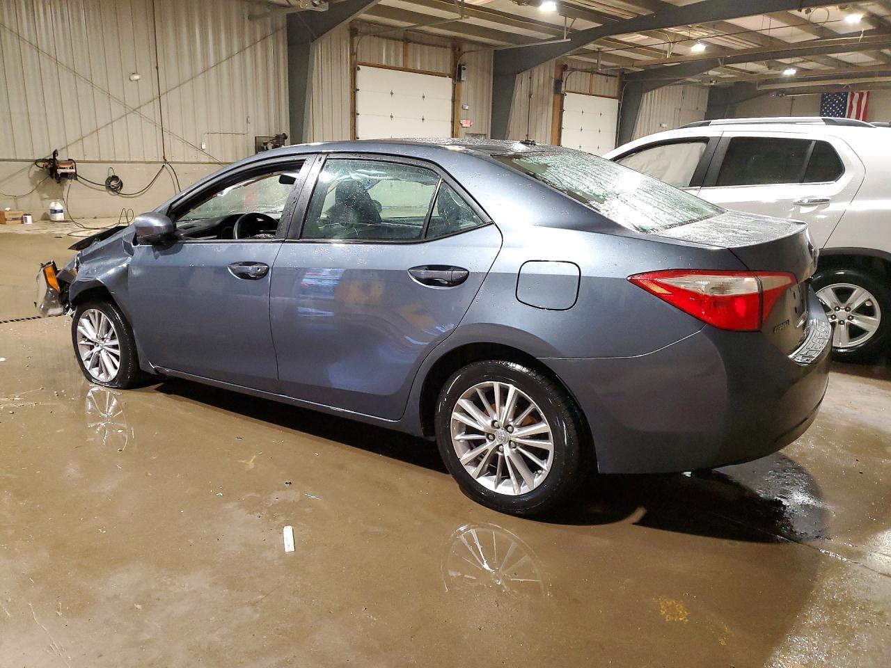 2014 Toyota Corolla L - Фото 2