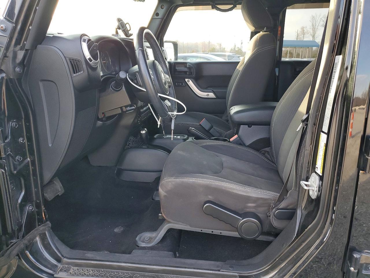 2015 Jeep Wrangler Unlimited Sahara - Фото 7