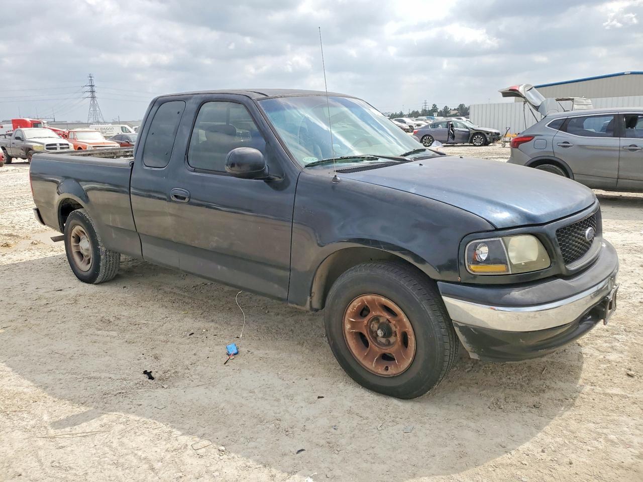 2002 Ford F150 - Фото 4