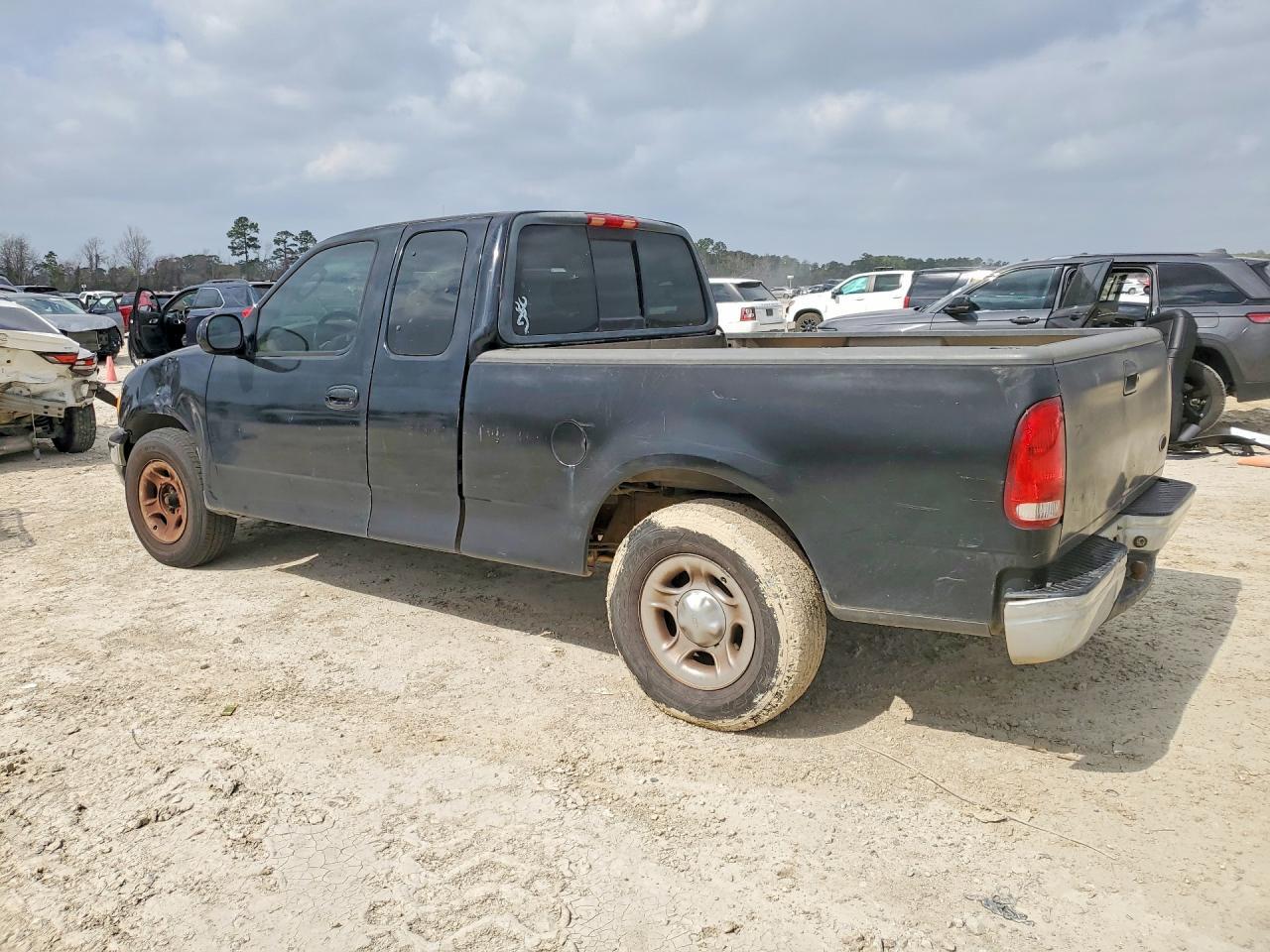 2002 Ford F150 - Фото 2