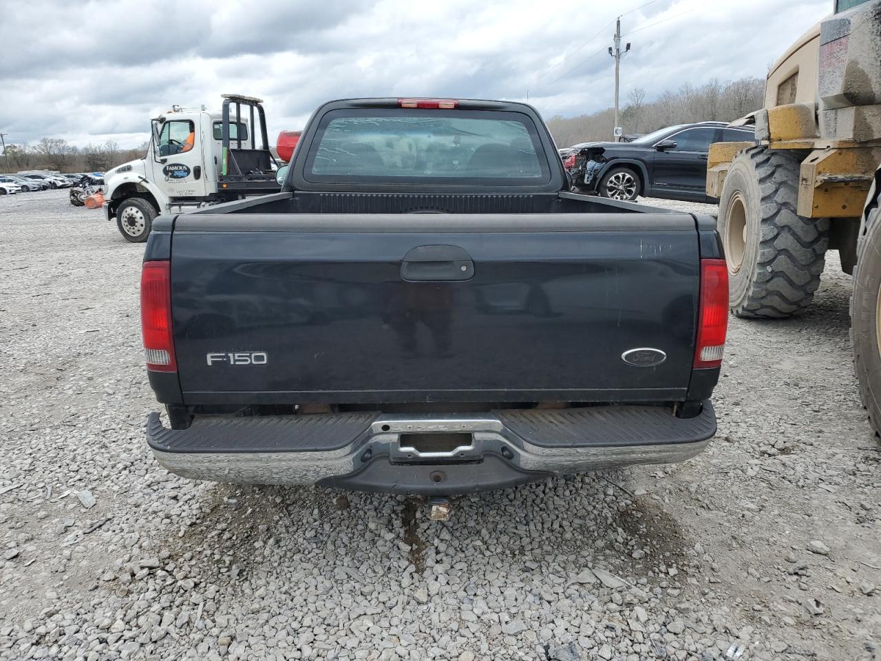 2003 Ford F150 - Фото 6