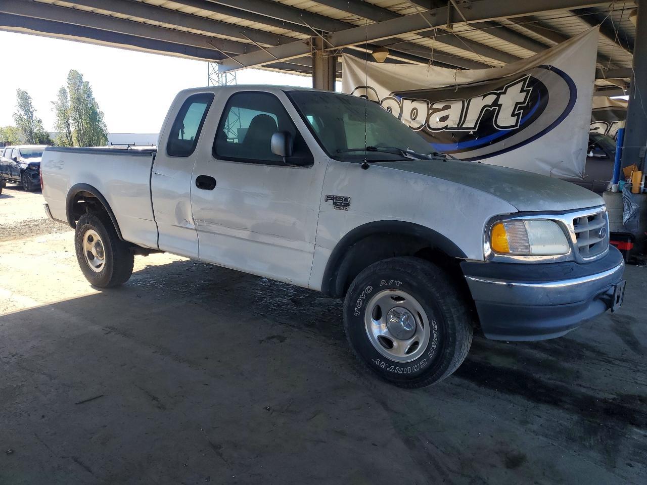 2002 Ford F150 - Фото 4