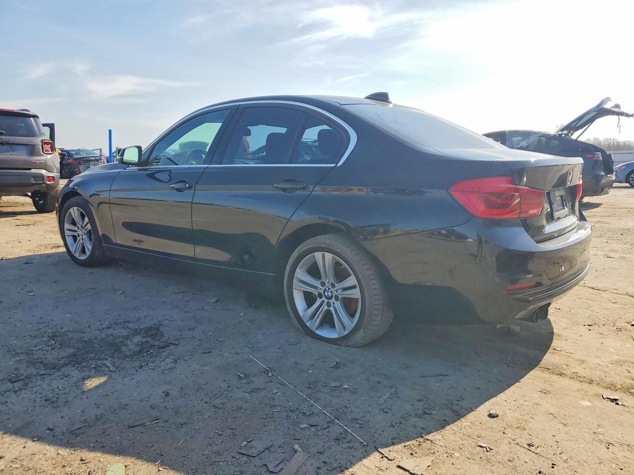 2017 BMW 330 I - Фото 2