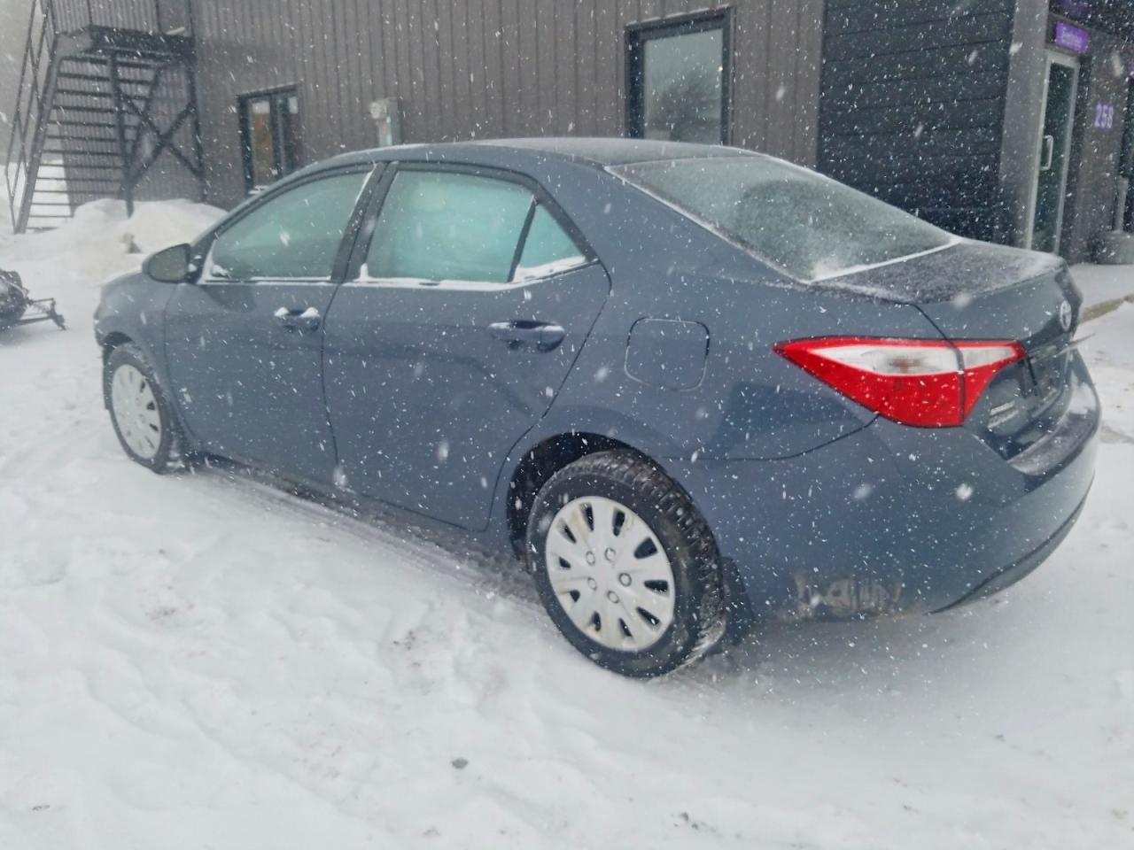 2014 Toyota Corolla Le - Фото 2