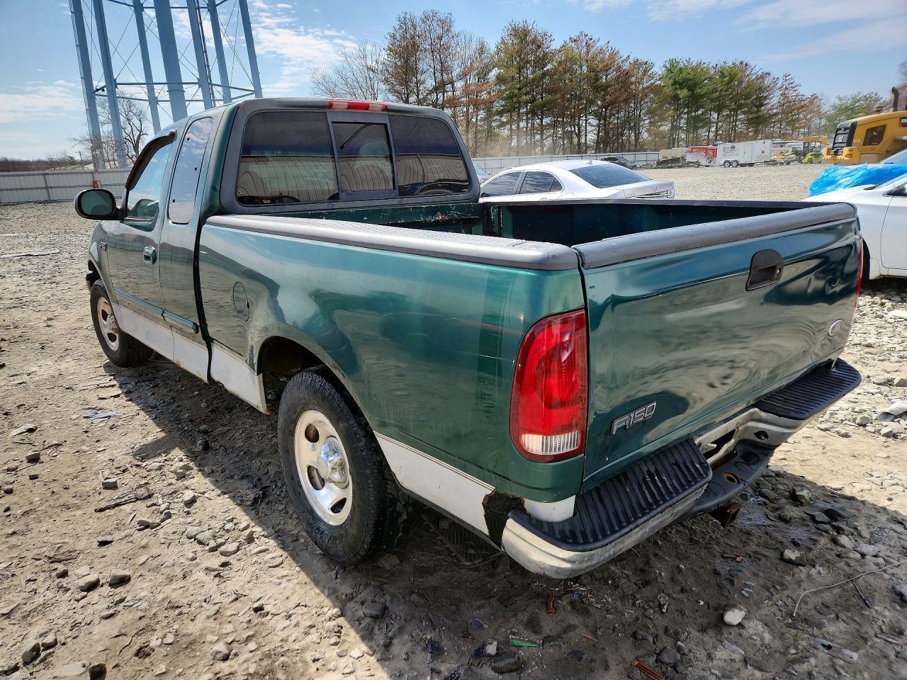 1999 Ford F150 - Фото 2